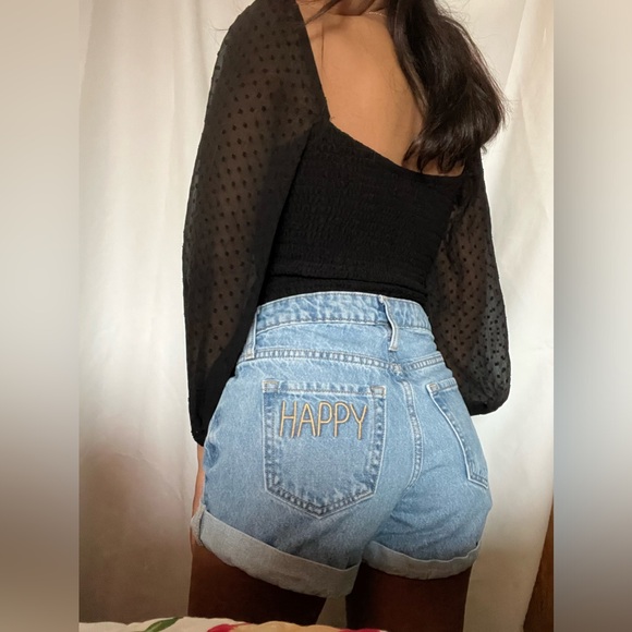 Black crop top. Very soft and had bubble sleeves that are see throught. - Picture 3 of 7